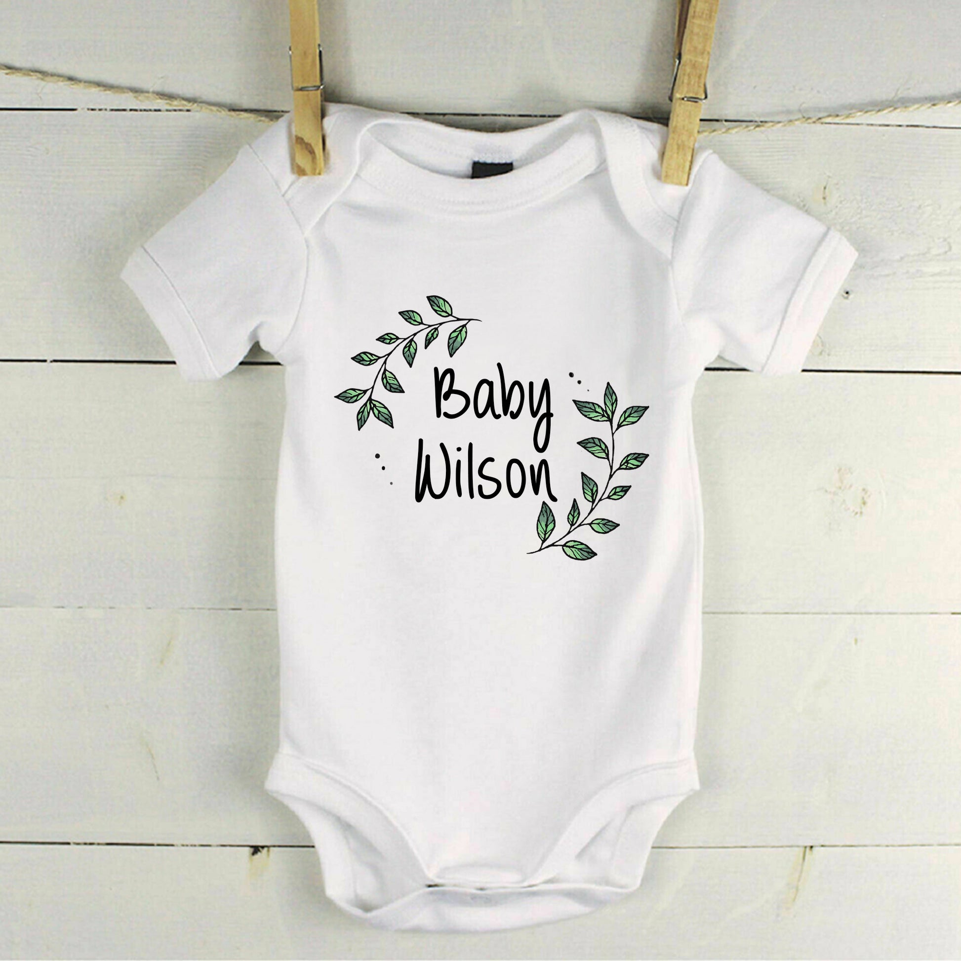 Personalised Baby Surname Botanical Leaf Wreath Baby Grow Vest